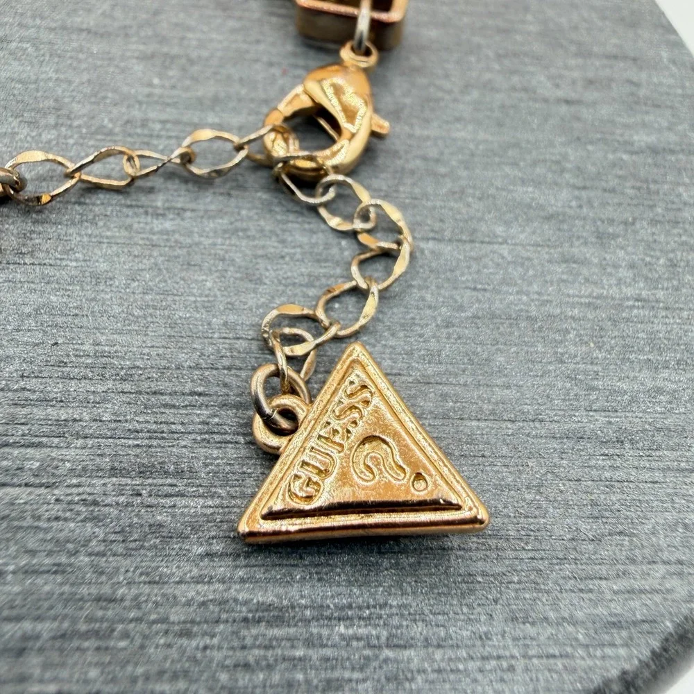 GUESS Gold Tone Chunky Geometric Link Chain Bracelet Logo Charm Adjustable Style